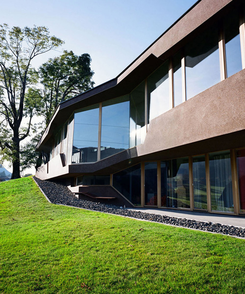 HOLODECK architects completes embedded house in austria