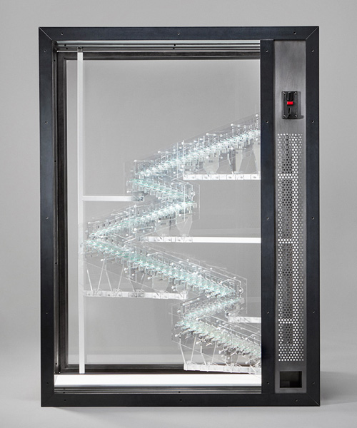 jelle mastenbroek's glassworks vending machine plays on monetary value