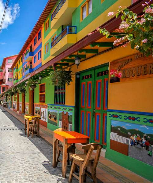 jessica devnani's saturated streetscapes capture colombia's colorful town of guatapé