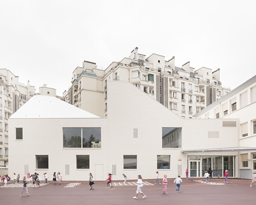 joly & loiret completes asymmetric dance and music building for school in versailles