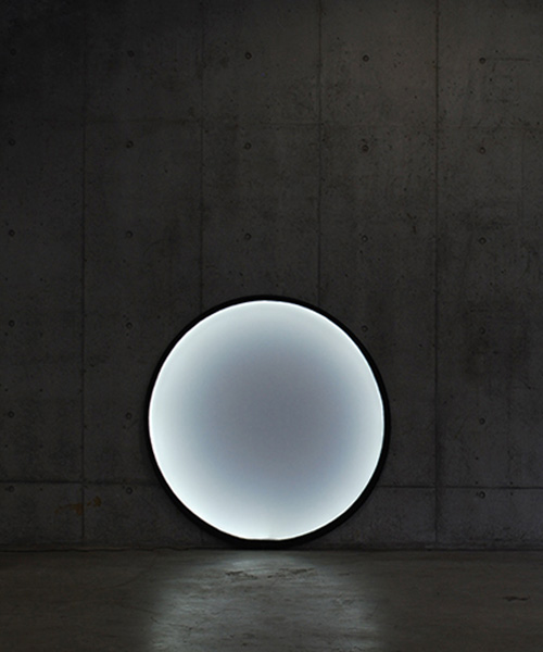 kazuhiro yamanaka's collapsible moon lamp unfolds like photo-reflectors