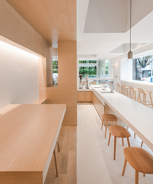 lukstudio creates a café and coworking space in a body of white boxes