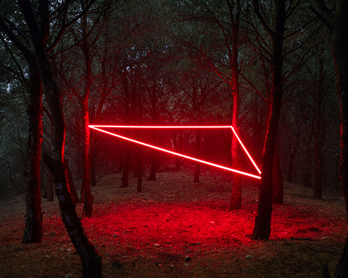 nicolas rivals weaves a luminous red line across natural landscapes in spain