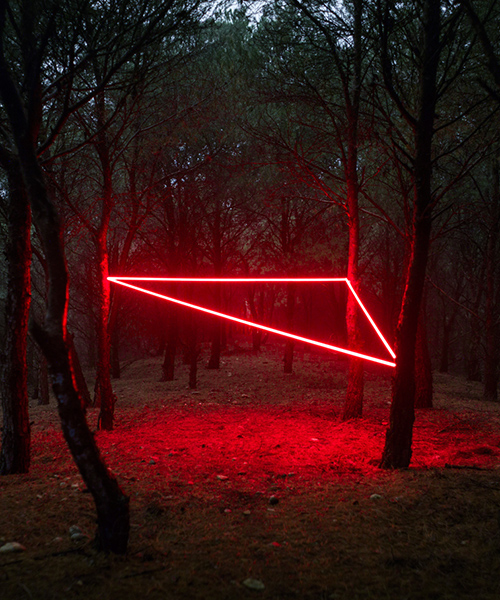 nicolas rivals weaves a luminous red line across natural landscapes in spain