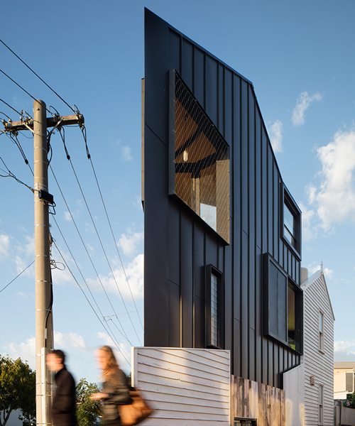 wedge-shaped family home inserted into melbourne neighborhood by OOF! architecture