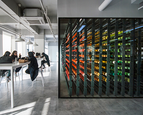 slowstudio combines office, storage+exhibition into co-working space