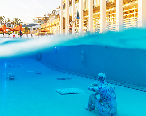 machine project's underwater art show is submerged in a swimming pool in LA