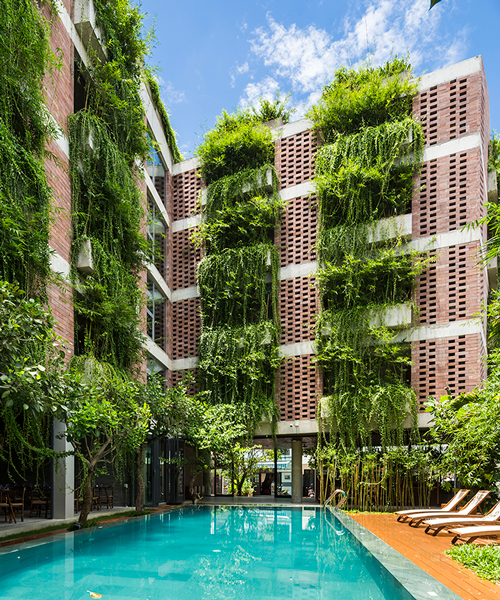 vo trong nghia drapes layer of greenery to balconies of atlas hotel vietnam