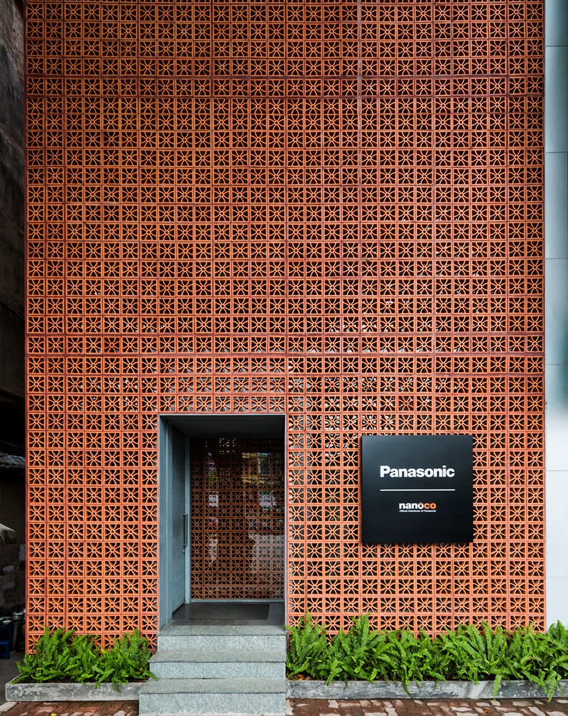 vo trong nghia stacks terracotta brick façade for panasonic showroom