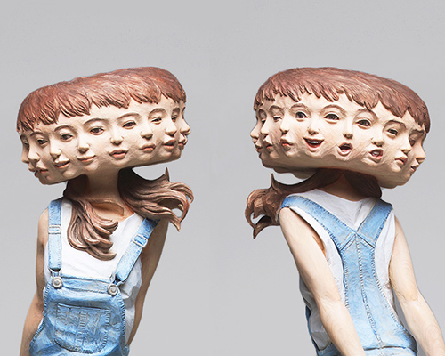 yoshitoshi kanemaki chisels larger-than-life wooden glitch sculptures from tree bark