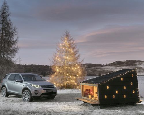 land rover builds a compact yet cosy christmas cabin for santa claus