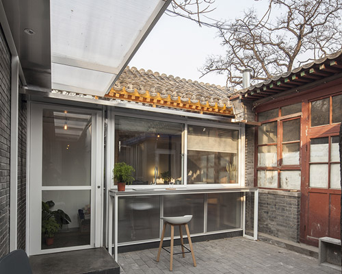 OEU-ChaO transforms beijing hutong into a cosy, cabin-like home