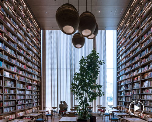 akane moriyama's towering translucent curtains for hirakata T-SITE bookstore