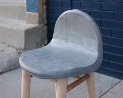 daniel lev coleman's 'lintite' chair is made from dryer lint + concrete