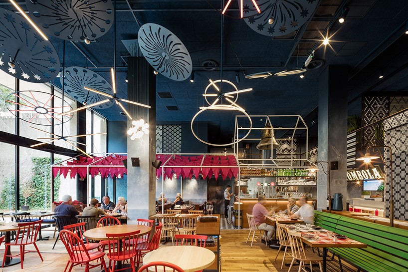 el equipo creativo forms vibrant village setting inside messi's restaurant in barcelona