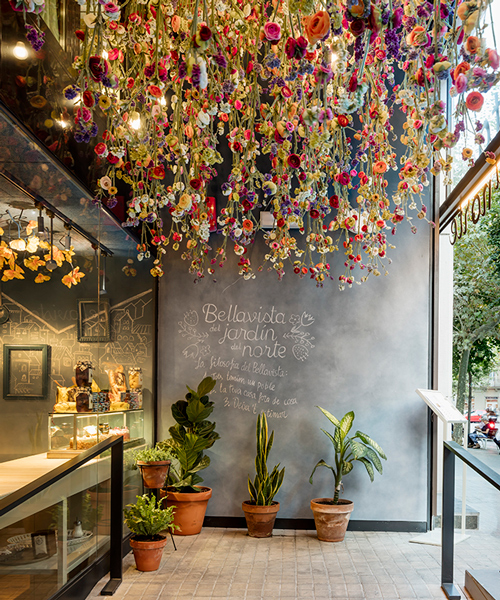 el equipo creativo forms vibrant village setting inside messi's restaurant in barcelona