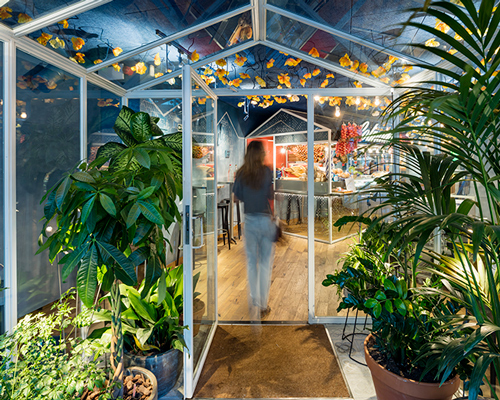 el equipo creativo forms vibrant village setting inside messi's restaurant in barcelona