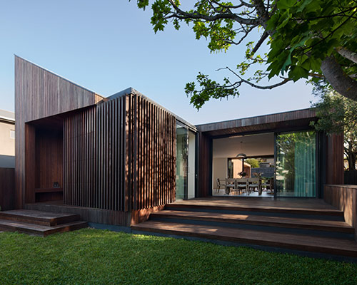 coy yiontis architects design humble house for traveling couple