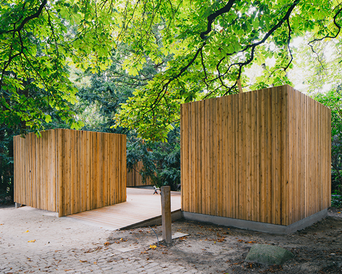 jan rösler architekten's wooden storage facilities situated in berlin cemetery