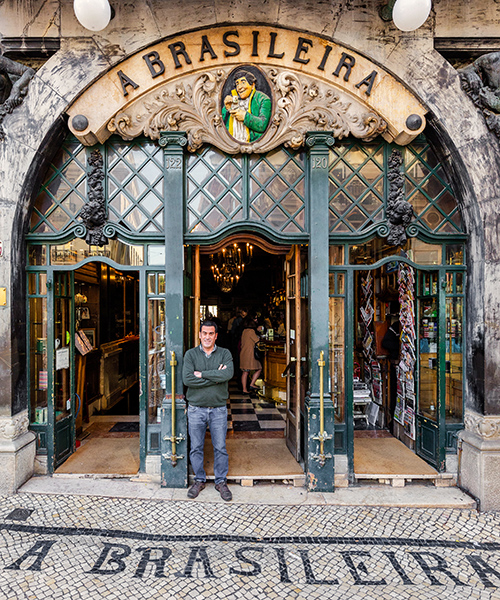decorative tiles and typography tell the story of lisbon through its storefronts