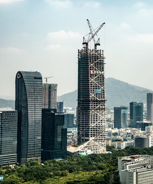 hanking center tower by morphosis architects tops out in shenzhen
