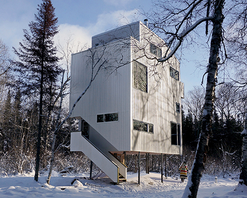 DIN projects elevate pole house overlooking lake winnipeg