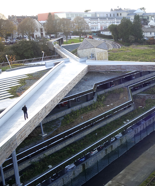 tetrarc connects vitré railway station with footbridge that doubles as observation deck