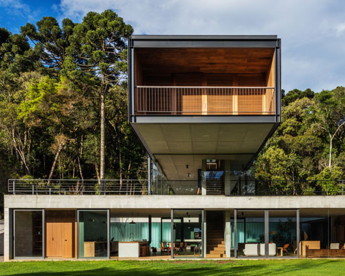 rural brazilian house by una arquitetos is a composition of interlocking volumes
