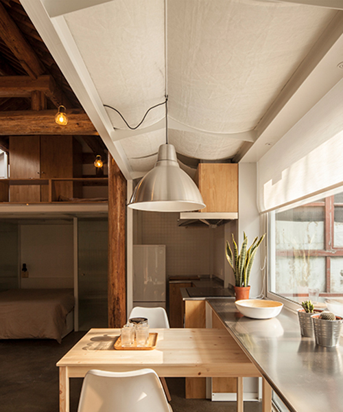 OEU-ChaO transforms beijing hutong into a cosy, cabin-like home