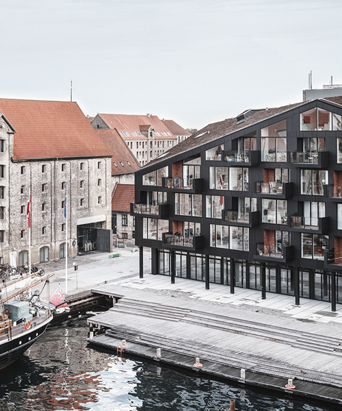 COBE + vilhelm lauritzen mimics existing warehouses in copenhagen housing project