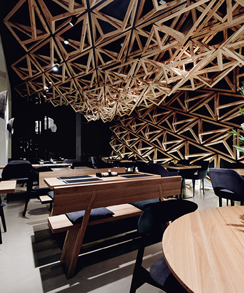 400 wooden triangles envelope kido sushi bar by DA architects in st. petersburg