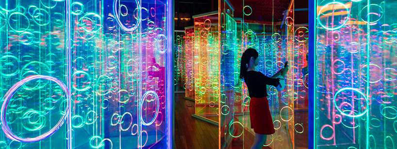 rainbow-hued light labyrinth by brut deluxe forms an immersive infinity ...