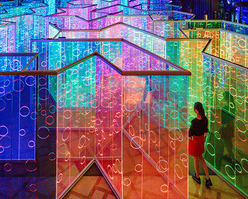 rainbow-hued light labyrinth by brut deluxe forms an immersive infinity room in china