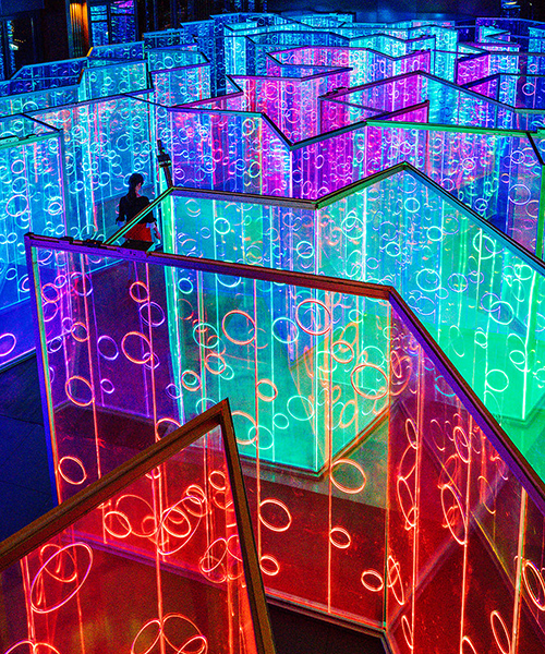 rainbow-hued light labyrinth by brut deluxe forms an immersive infinity room in china