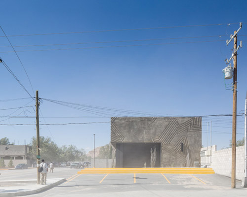 jorge urias studio's carved concrete structure portrays local dynamics in juarez, mexico