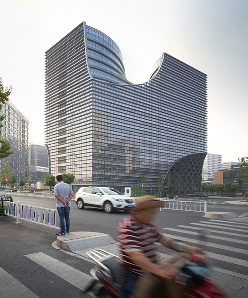 JDS architects defines hangzhou gateway in china with curved voids