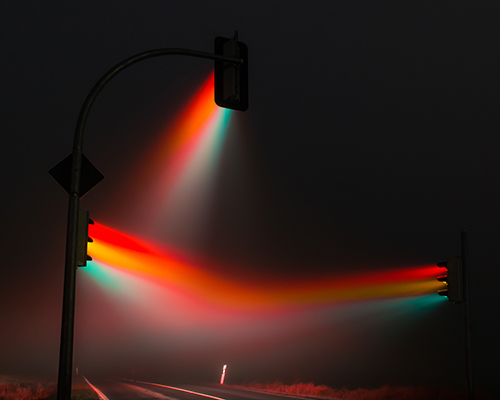 lucas zimmermann's surreal traffic lights illuminate misty german streets
