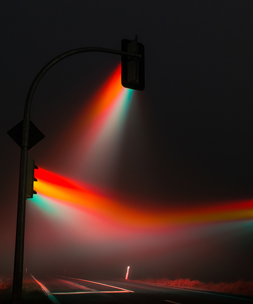 lucas zimmermann's surreal traffic lights illuminate misty german streets