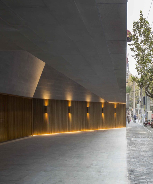 neri & hu combines stone and brass for new shanghai theatre