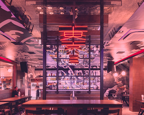 PHTAA living design's neon-lit restaurant evokes japanese anime culture
