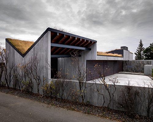 studio granda builds bakkaflot 14 under pitched green roof