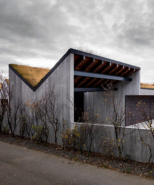 studio granda builds bakkaflot 14 under pitched green roof