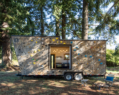 tiny heirloom clads mobile home with reconfigurable rock climbing wall