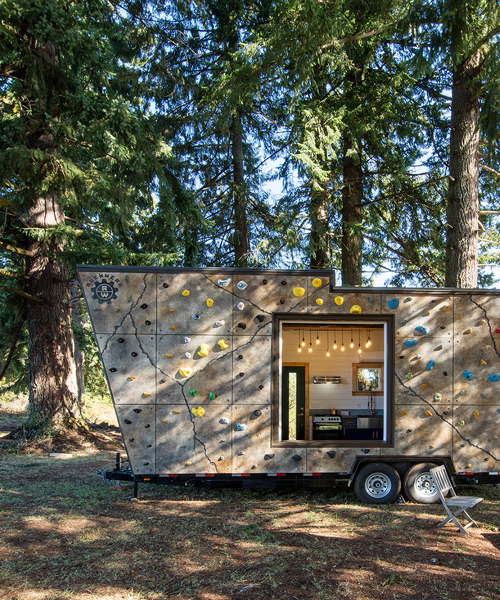 tiny heirloom clads mobile home with reconfigurable rock climbing wall