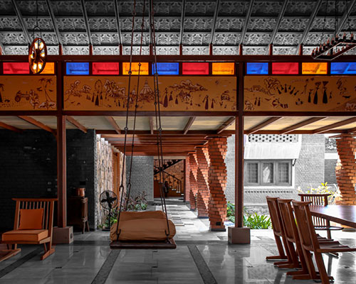 twisted columns sustain this red brick family home by d6thD design studio