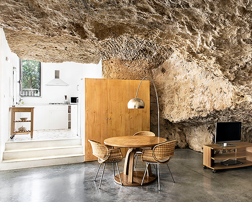 ummo estudio embeds cave home into limestone rock