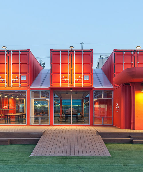 URBANTAINER extends the national theater company of korea with modulated red shipping containers