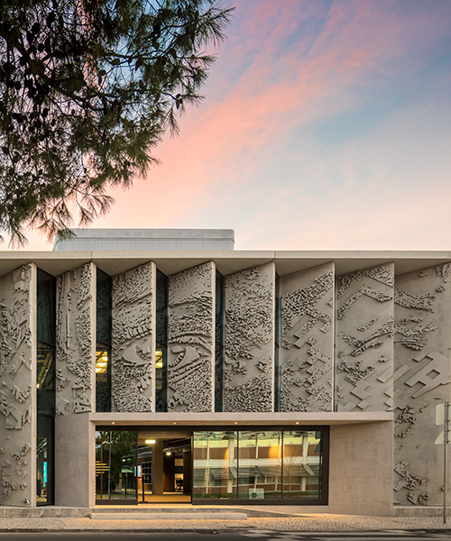 vhils carves into concrete with bas-relief composition on GS1 portugal HQ in lisbon