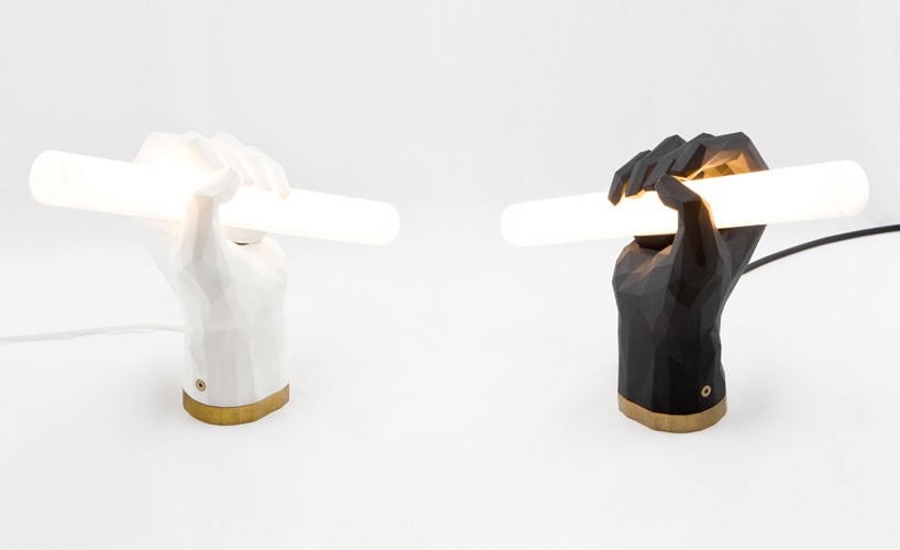 das happy medium puno fist lamp designboom