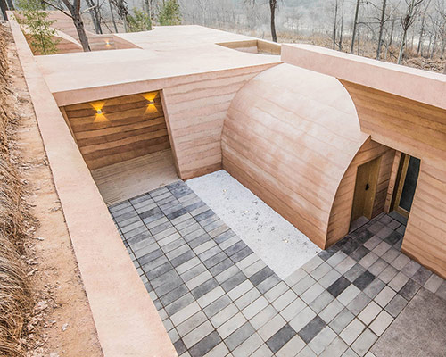 hyperSity architects renovates ruins of traditional chinese cave house